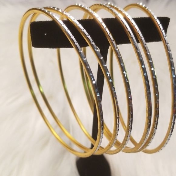 Goldtone and Silver Bangle Bracelets - Picture 1 of 6